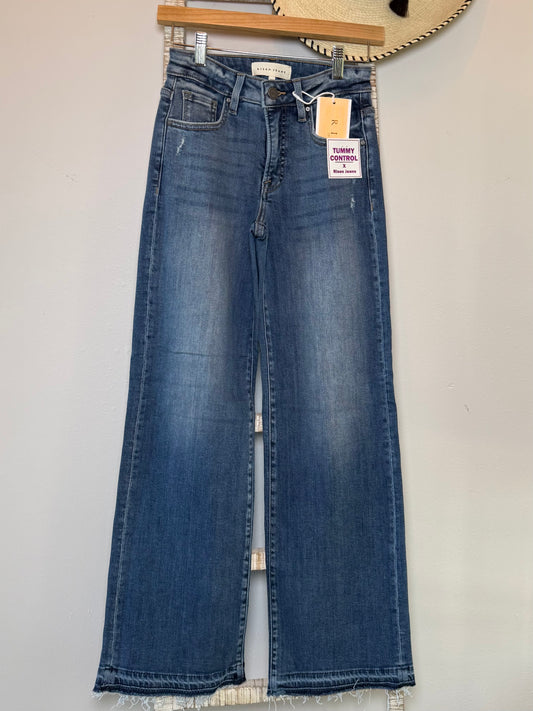 Risen Mid Rise Wide Leg Shadow Hem Jean